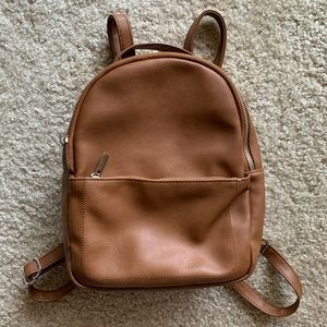 Cute, small accessory/purse back pack.